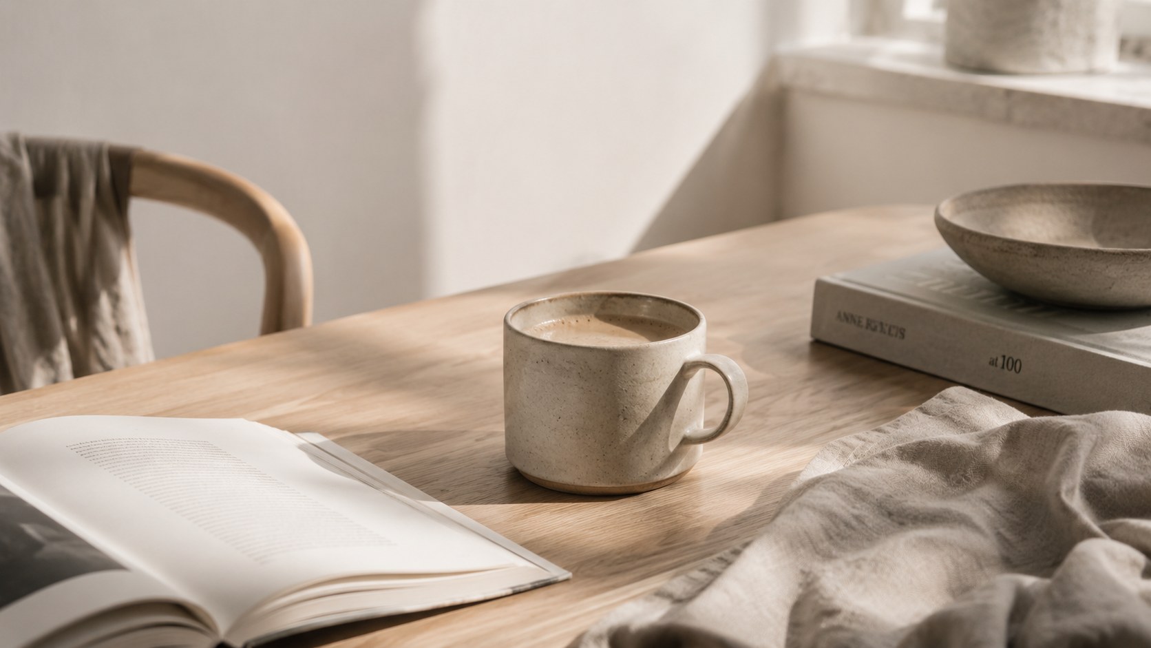 Ceramic cup, wooden table and soft morning light
